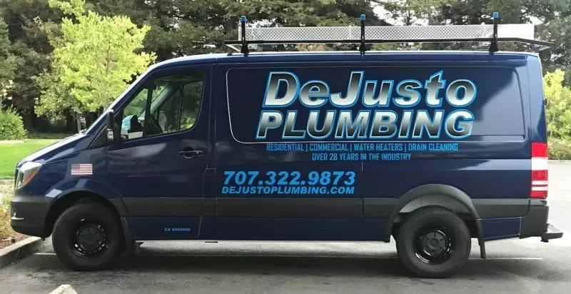 the dejusto plumbing van that drives to clients houses for plumbing needs