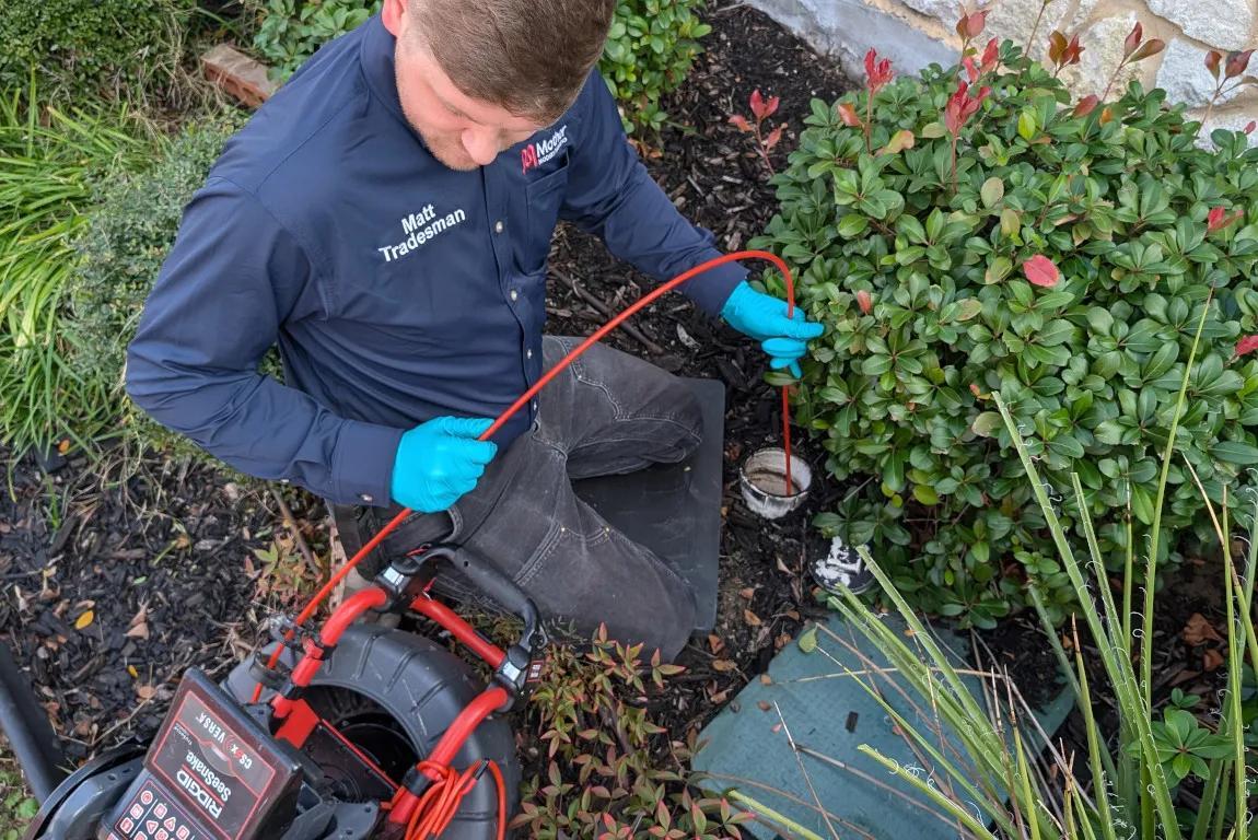 Professional drain cleaning equipment used to clear sewer line blockages